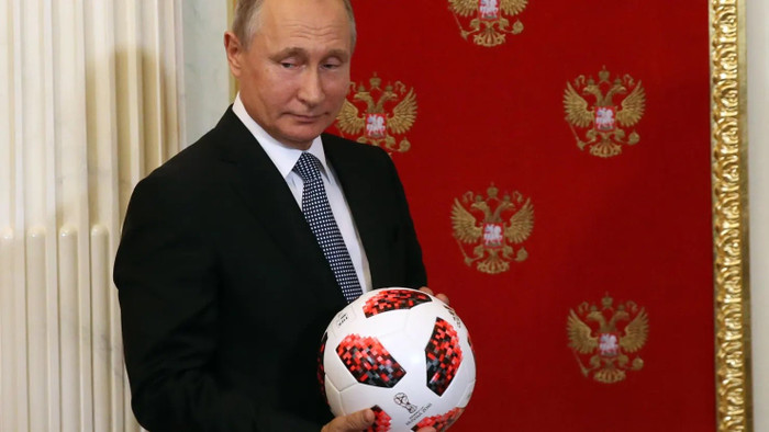 107089491-1657899120118-gettyimages-999375232-rus-russian-president-vladimir-putin-passes-symbolic-fifa-world-cup-baton-to-qatar-emir-tamim-bin-hamad-al-thani-at-the-kremlin.jpg