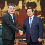 Thủ tướng Phạm Minh Chính và ông Kim Hyoung-nyon, Phó Chủ tịch Tập đoàn Dunamu.